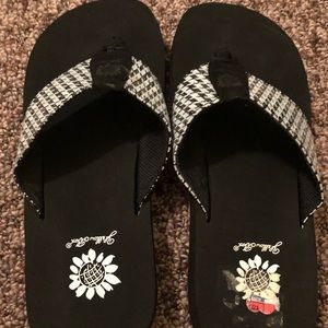 Black and white yellow box sandals